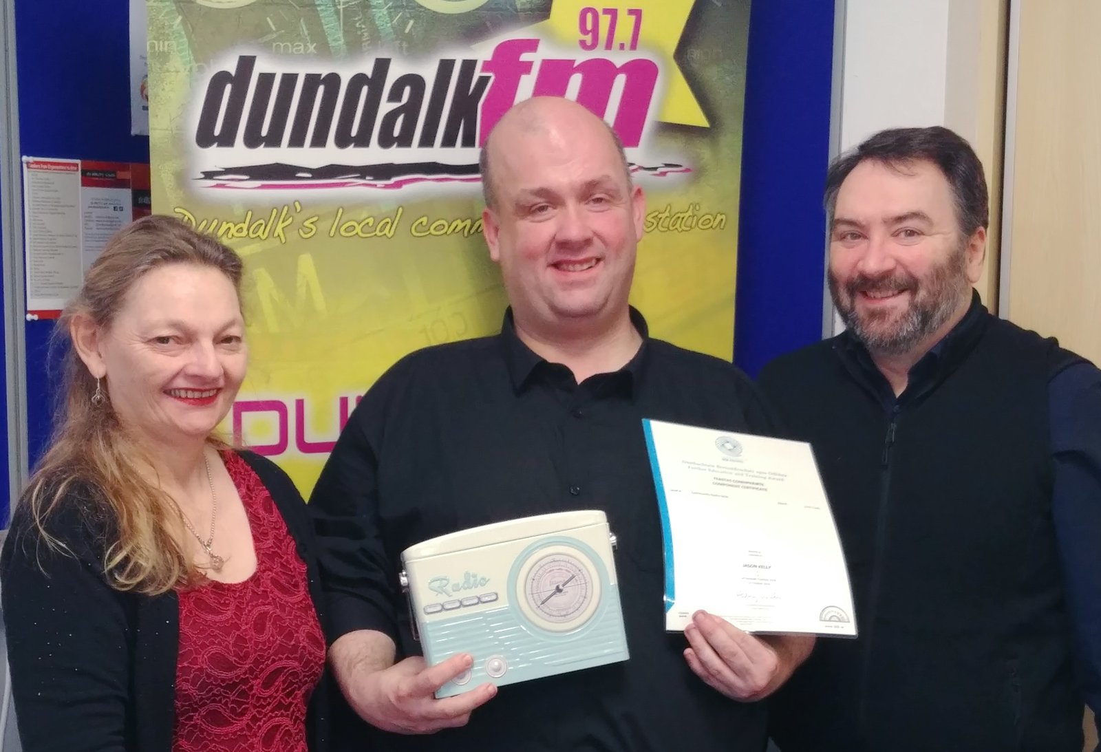 Jason Kelly receiving Dundalk FM training certificate